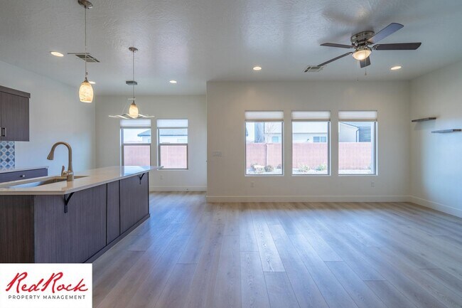 Building Photo - Comfort, Space & Style with a 3-Car Garage Small Dog Friendly!