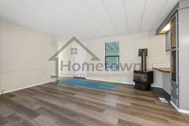 Building Photo - 2-Bedroom 2-Bathroom Home with Off-Street Parking Available in Coeur d’Alene!