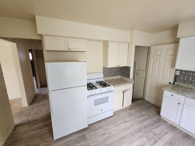 Building Photo - Move-In Special: Save $300 on This Charmin...