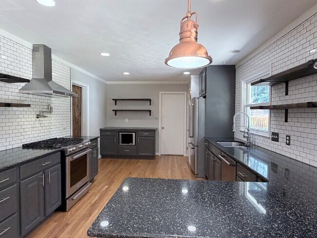 Building Photo - Updated 3BR Home in Beaver Lake | Fenced Yard, Garage, Covered Porch & Outdoor Fireplace | Pet Fr...