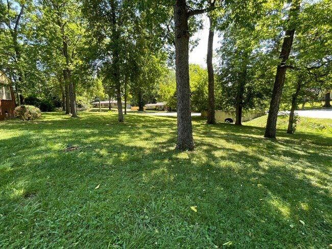 Building Photo - Beautiful Home located on .53 Wooded Corner Lot.