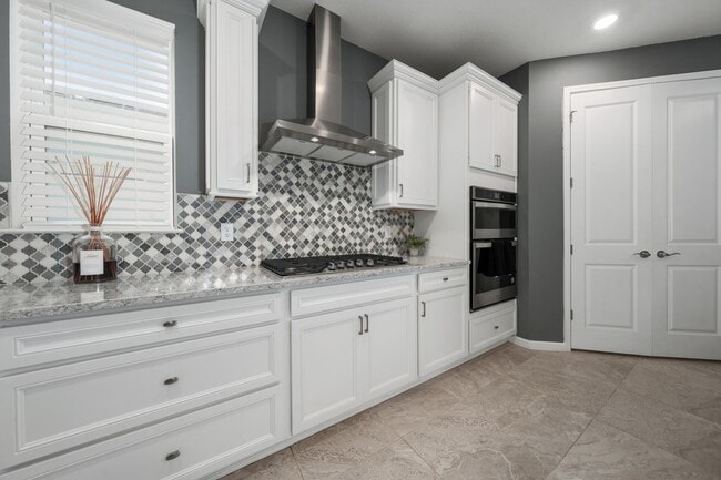 Building Photo - Immaculate Executive Home in Isles of Lake Nona