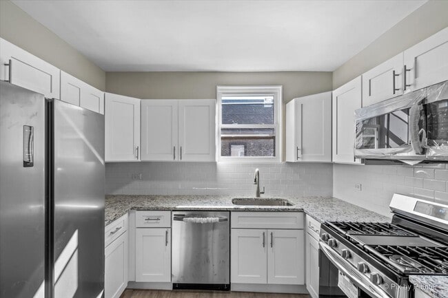 Building Photo - 7815 S Langley Ave