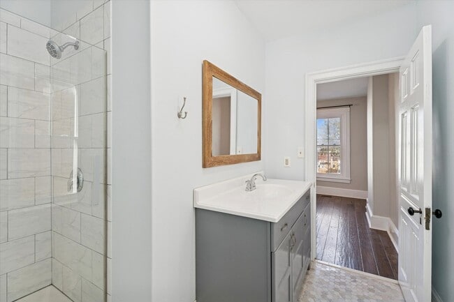 Building Photo - Stylish Phoenixville Rowhome with Exposed Brick, High Ceilings & Central Air