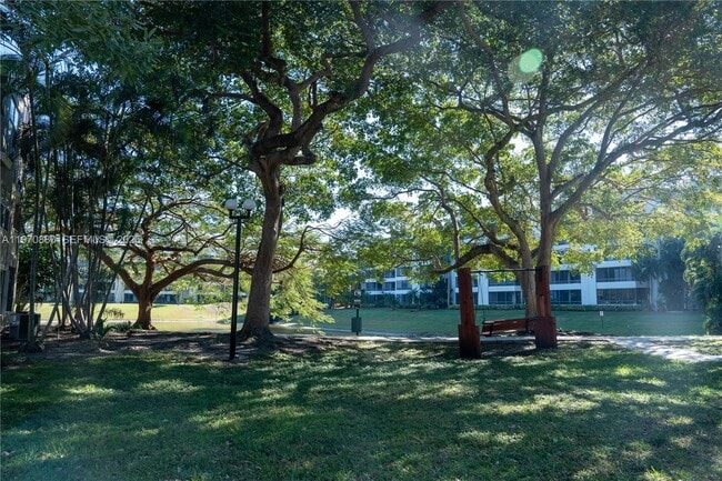 Building Photo - 1865 Palm Cove Blvd