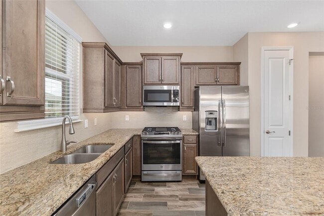 Building Photo - 5587 NW 40th Pl