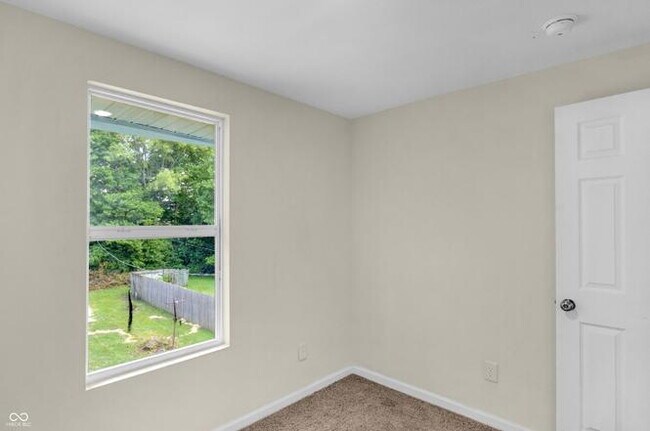 Building Photo - "Charming 3-Bed Duplex with Modern Comforts at 2235 MLK Jr Street, Indianapolis!"