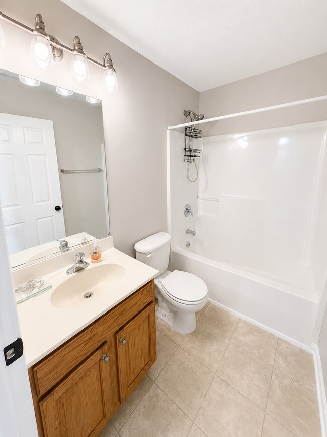 Building Photo - Beautiful 3-Bedroom Townhome with Pond View | Lawn Care Included | Convenient Whitsett Location