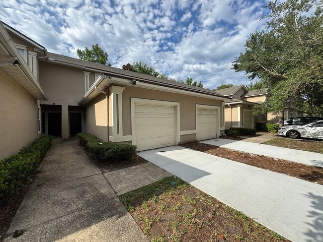 Building Photo - Available Now! Westside Timothy's Landing 2/2.5 Townhome with a 1-Car Garage