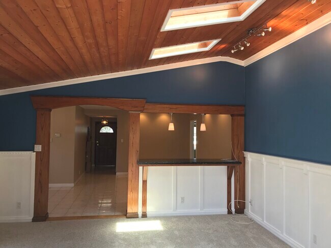 View from family room into original living room. - 14911 Fonthill Ave