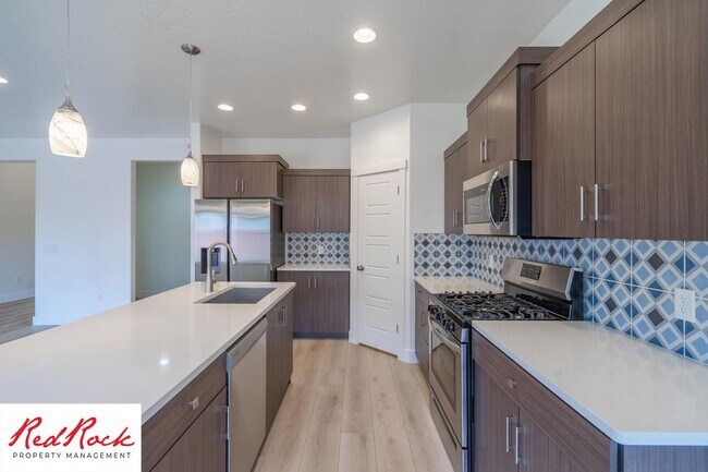 Building Photo - Comfort, Space & Style with a 3-Car Garage Small Dog Friendly!