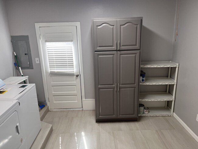 Utility/mud room with brand new washer/dryer and pantry - 132 Elwood Dr