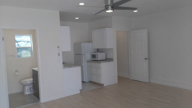 Bedroom and kitchen - 22638 Saticoy St