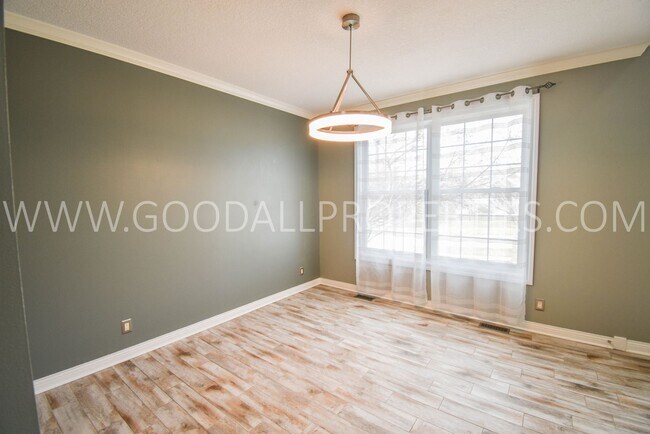 Building Photo - 4 Bedroom 4 Bath Executive Home in West Des Moines with a fenced in yard and a 3-car garage