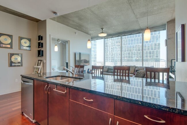 Building Photo - Downtown Luxury Living at The Encore