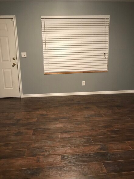 Living room with big picture window - 434 W 7th Street