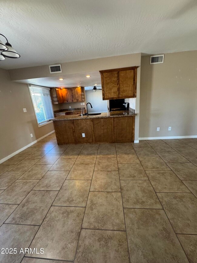 Building Photo - 3753 E Charter Oak Rd