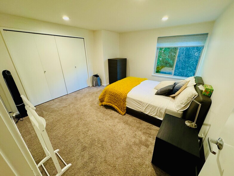 The primary room offers a well-thought-out layout, providing flexibility for various layouts - 2145 Dexter Ave N