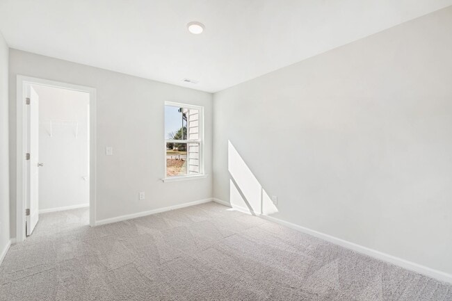 Building Photo - Luxurious 3-Bedroom Townhome Living in the...