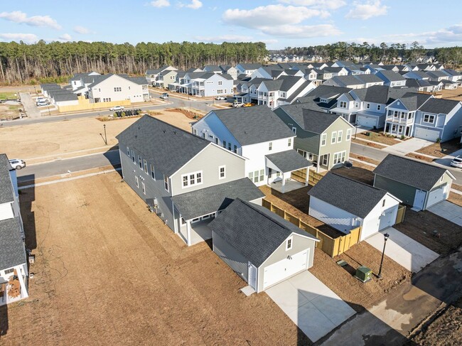 Building Photo - This brand-new home makes a statement from the moment you arrive!