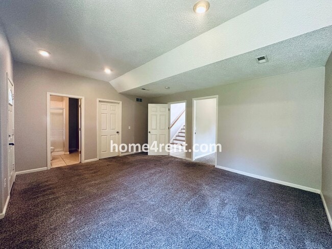 Building Photo - Brand New Paint, Wood Floors, Walkout Fini...