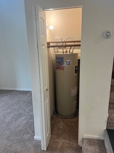 Hot water tank in closet on main - 10320 NE 186th St