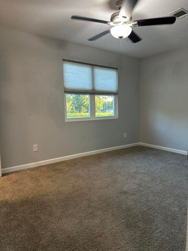 Building Photo - Move-In Ready Corner-Lot Home with Wraparound Porch Near Fort Eisenhower