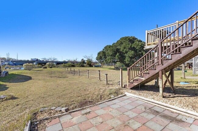 Building Photo - Beachside Living with Beautiful Bay Views