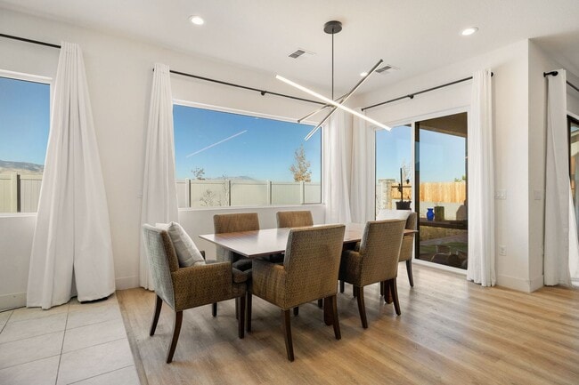 Building Photo - Beautiful 4BR/4BA home in the gated Copper View community. Features spacious living areas, mounta...