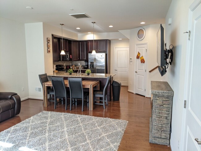 Building Photo - Bottom level (two story) *END UNIT* condo ...