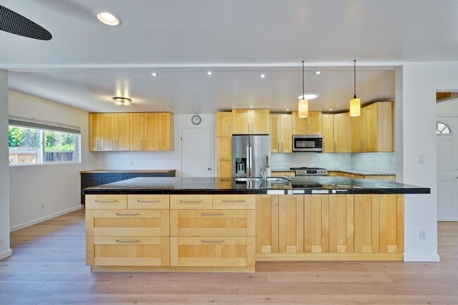 Building Photo - Welcome to this Beautifully Updated 3 Bed ...