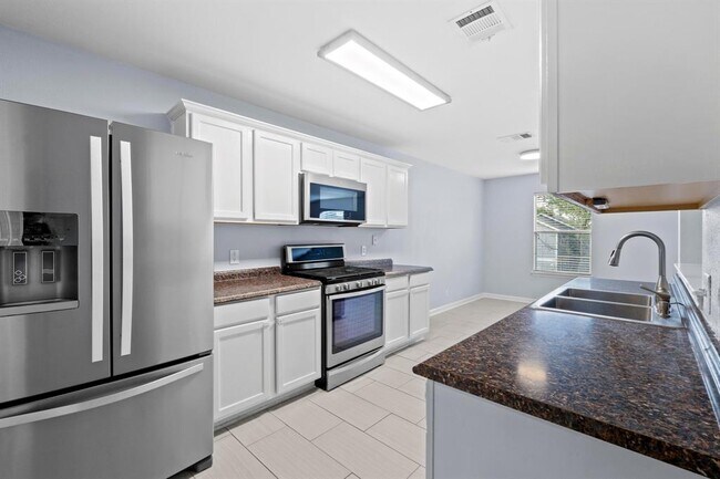 Building Photo - 6003 Wideleaf Dr