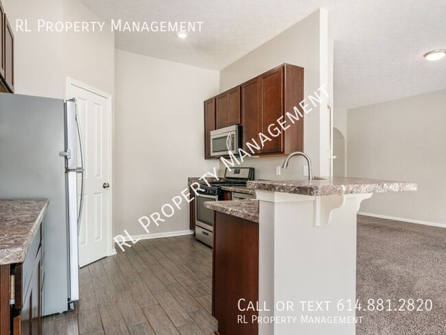 Building Photo - Spacious 4 bedroom 2 bathroom condo in Lew...