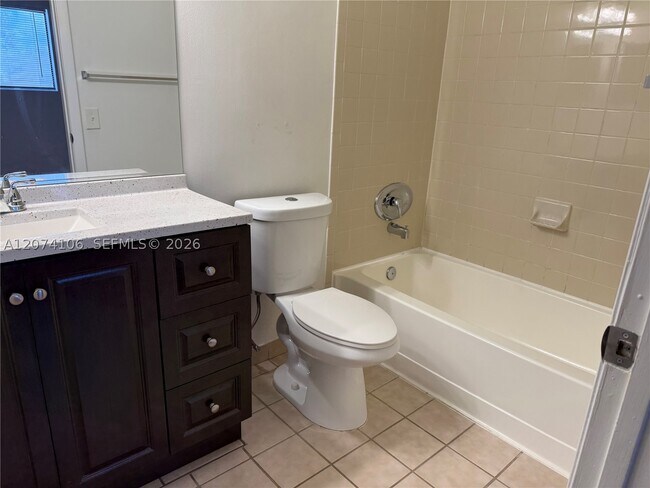Building Photo - 9454 Palm Cir S