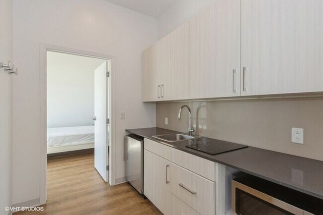 Building Photo - $1,699 | 1 Bedroom, 1 Bathroom Furnished A...