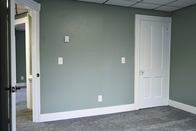 Master Bedroom with door to attic - 105 Willowbrook Rd