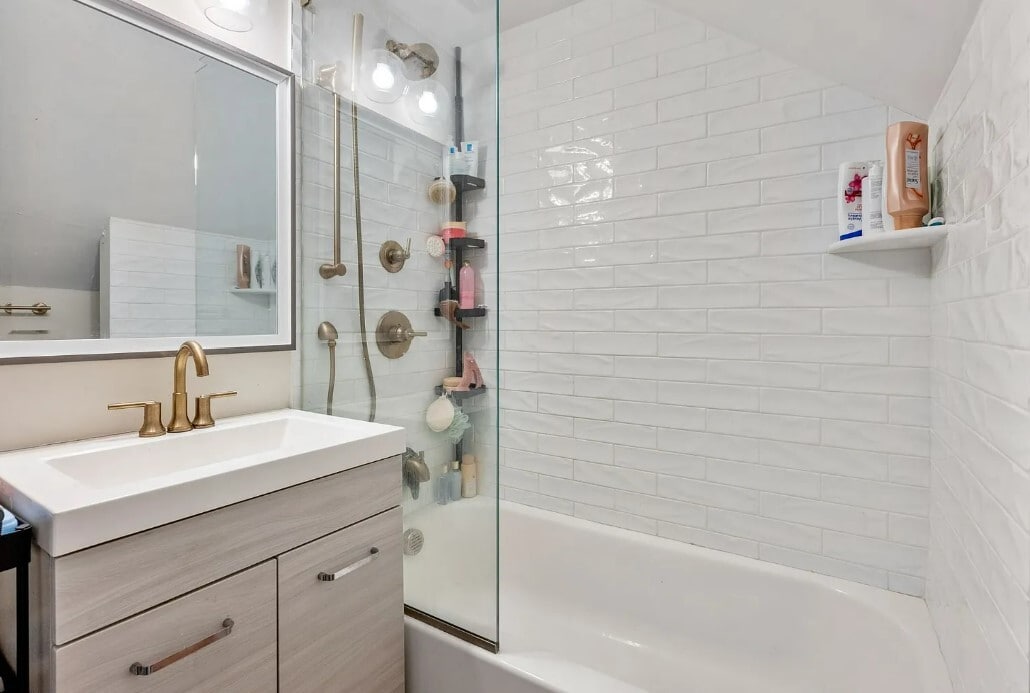 Full bath for bedrooms 3 and 4 - 169 W 9th St