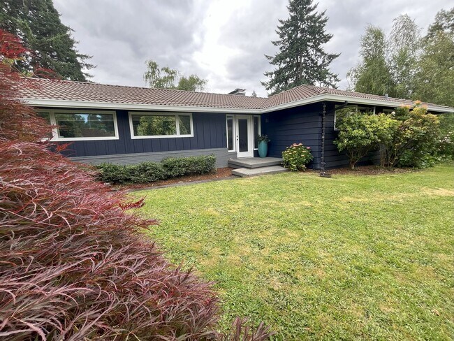 Primary Photo - Spacious 4-Bedroom Home with Lush Landscap...
