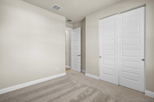 Building Photo - 8588 Dahlia Cir