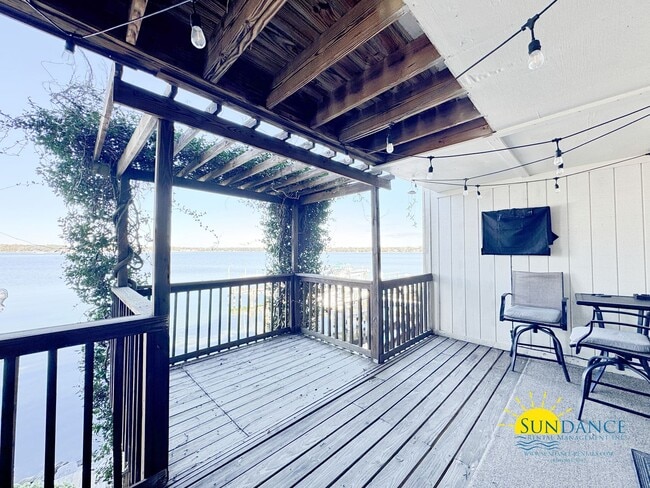 Building Photo - Waterfront Luxury Living on Garniers Bayou with Boat Slip/Lift Included!