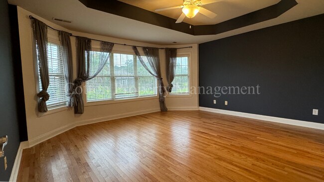 Building Photo - 4BR/3BA Well appointed home in the gated c...