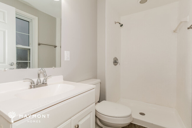 Building Photo - Spacious 4-Bedroom Home with Classic Touches