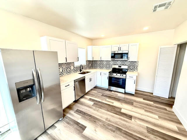 Building Photo - BRAND NEW TOWNHOME IN THE MIDDLE OF UPTOWN PHX WITH ALL THE BELLS AND WHISTLES!!!