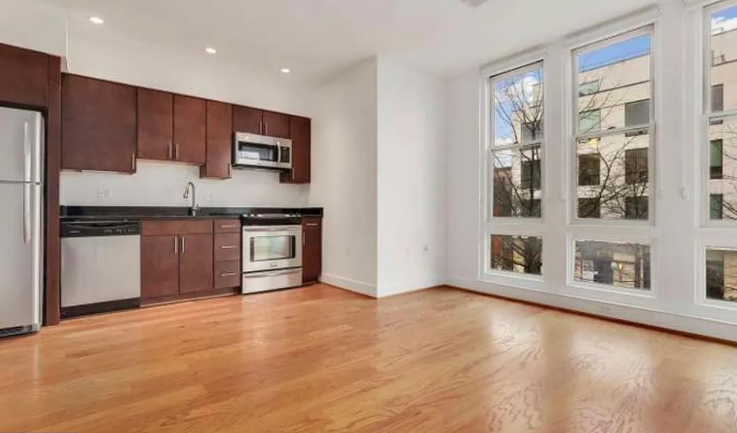 The open concept allows for easy entertaining. - 2910 Georgia Ave NW