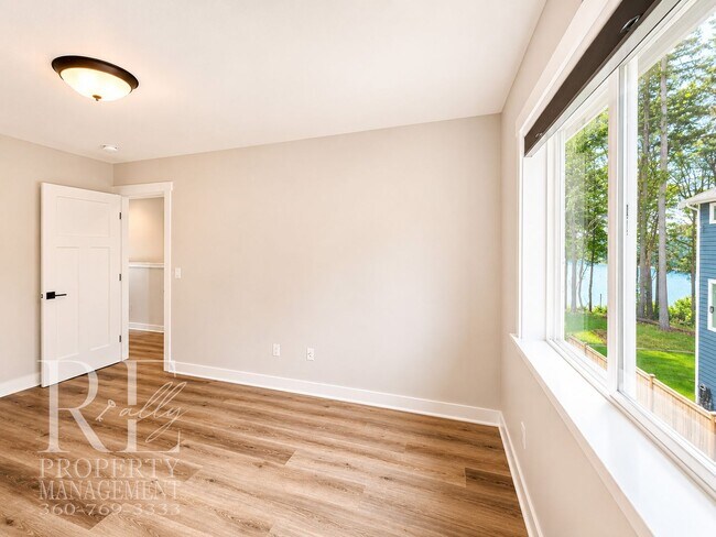 Building Photo - Luxury Poulsbo Retreat with Water Views, Covered Deck & Designer Finishes