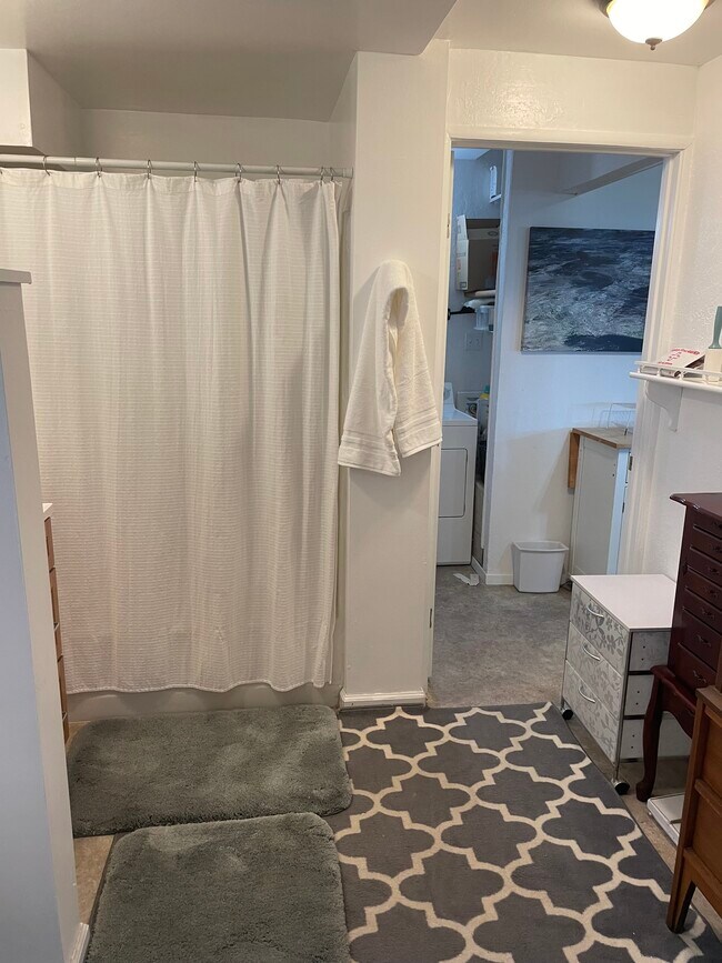 Bathroom looking at door to laundry. - 27 Graceland Dr