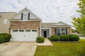 Building Photo - Stunning 4BR/3BA Home in Heritage Farms –  Ready to move-in!