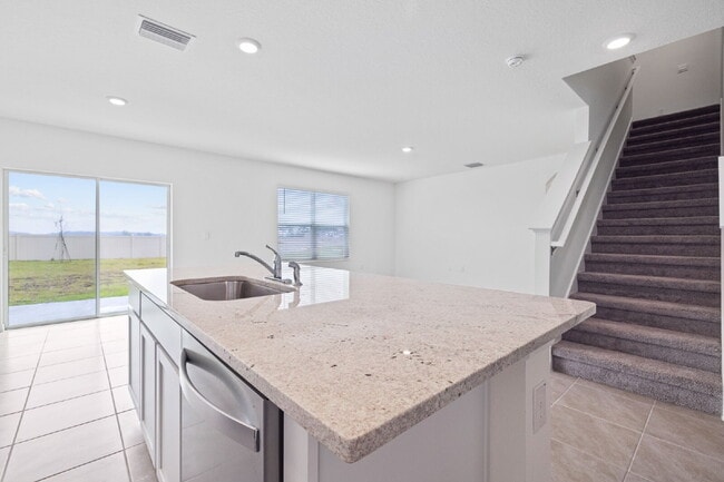 Building Photo - "Spacious 5-Bedroom Retreat with 3 Full Baths in Epperson Lagoon Wesley Chapel – 2,601 Sq. Ft. of...