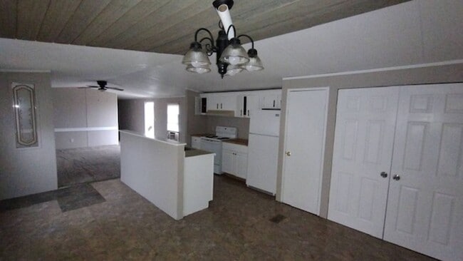 Building Photo - 3 Bedroom with 2 Baths on Large Fenced Lot