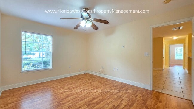 Building Photo - MOVE IN READY! LARGE 2 BEDROOM/2 BATH PLUS ATTACHED GARAGE! TILE/LVP THROUGHOUT!